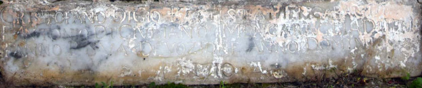 Iscrizione nella parte bassa della formella